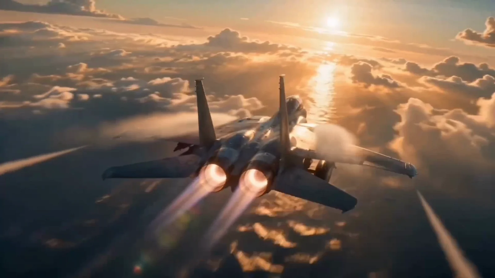 An aircraft above the clouds at sunset.